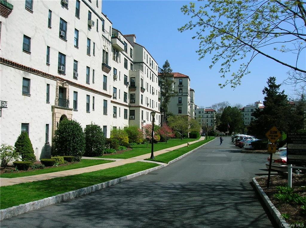 a view of a building with a yard