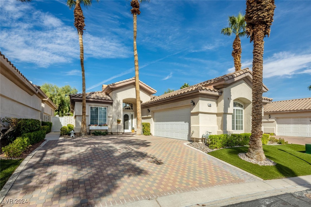 Front Structure of Home with Pavers for driveway a