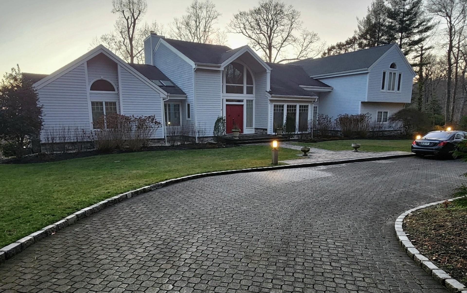 View of front of property featuring a yard