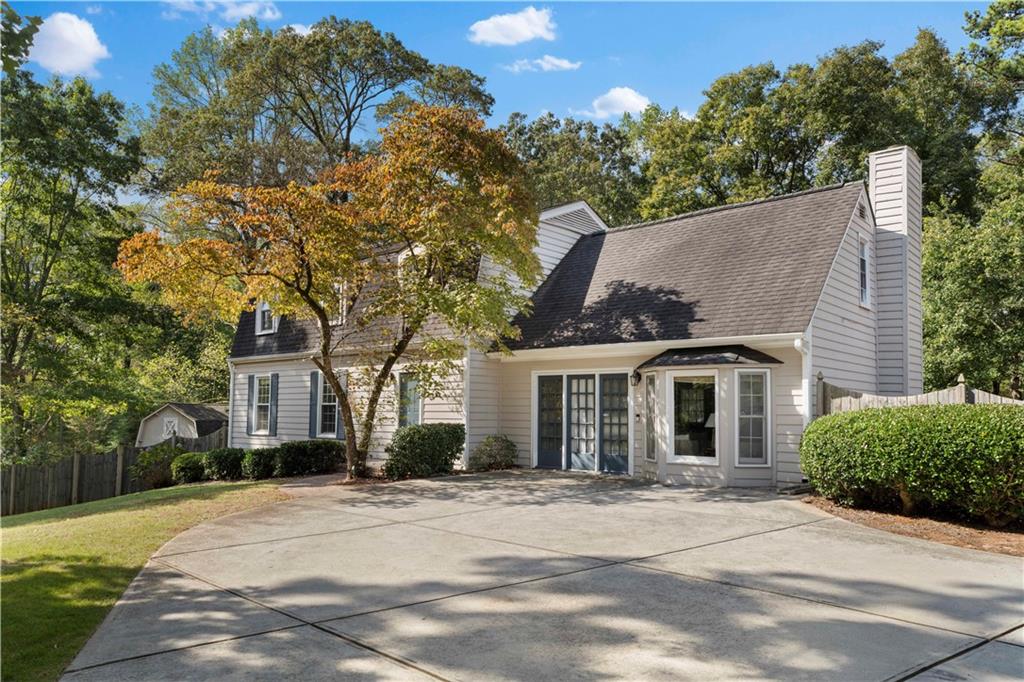 front view of a house with a trees