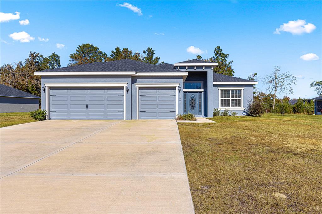 a view of a house with a garage