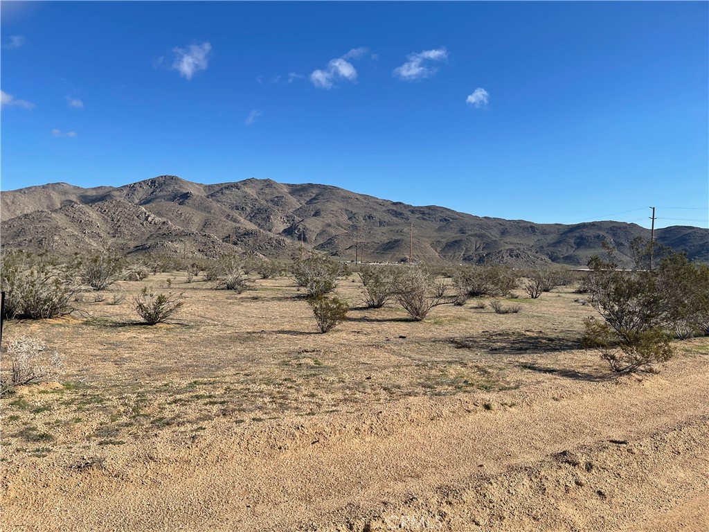 a view of mountain view with mountains in the background