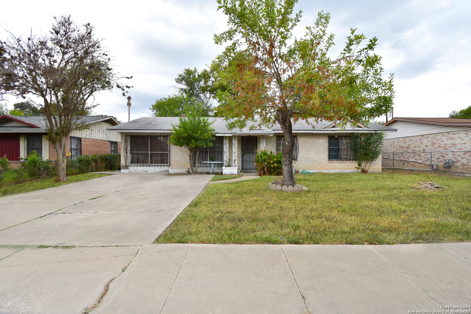 front view of a house with a yard