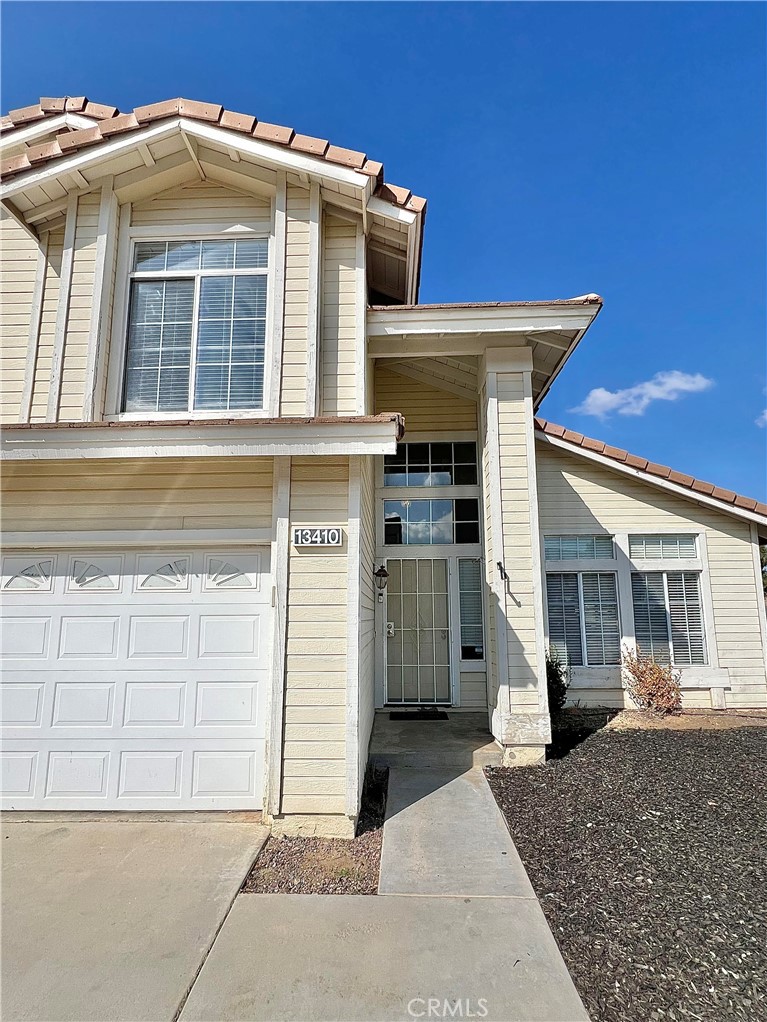 a view of a house with garage