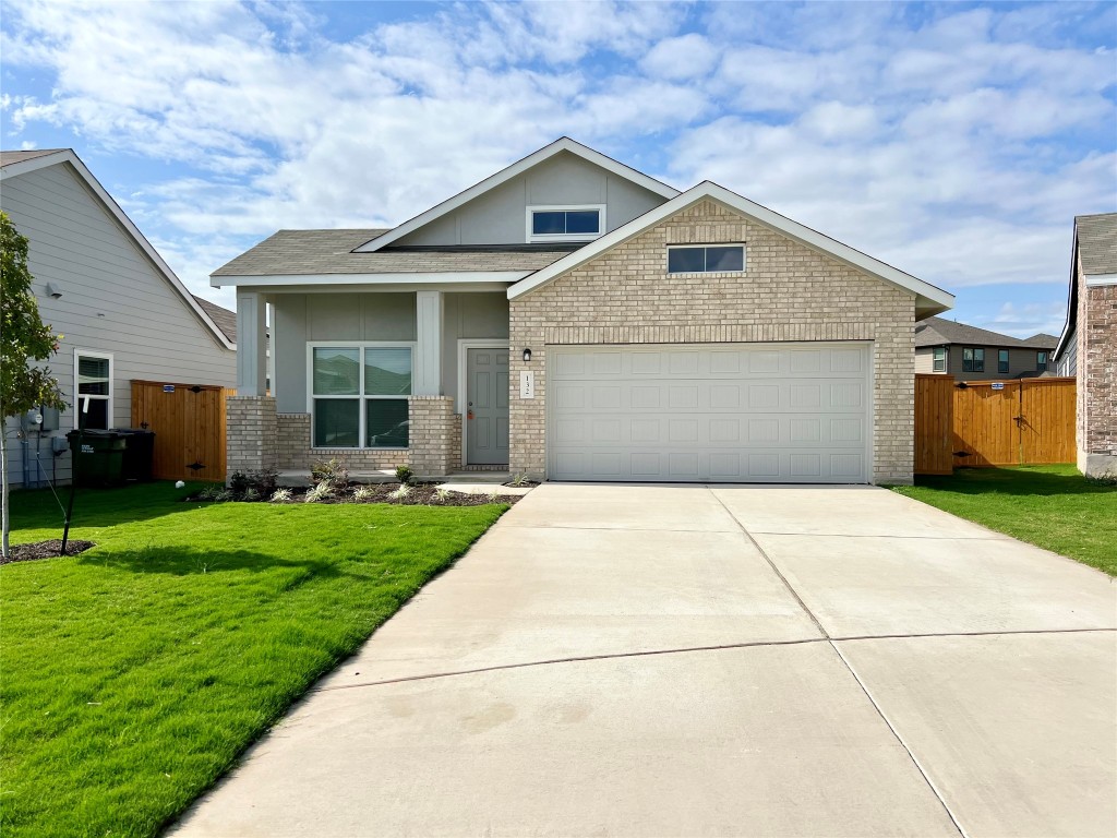 a front view of house with yard