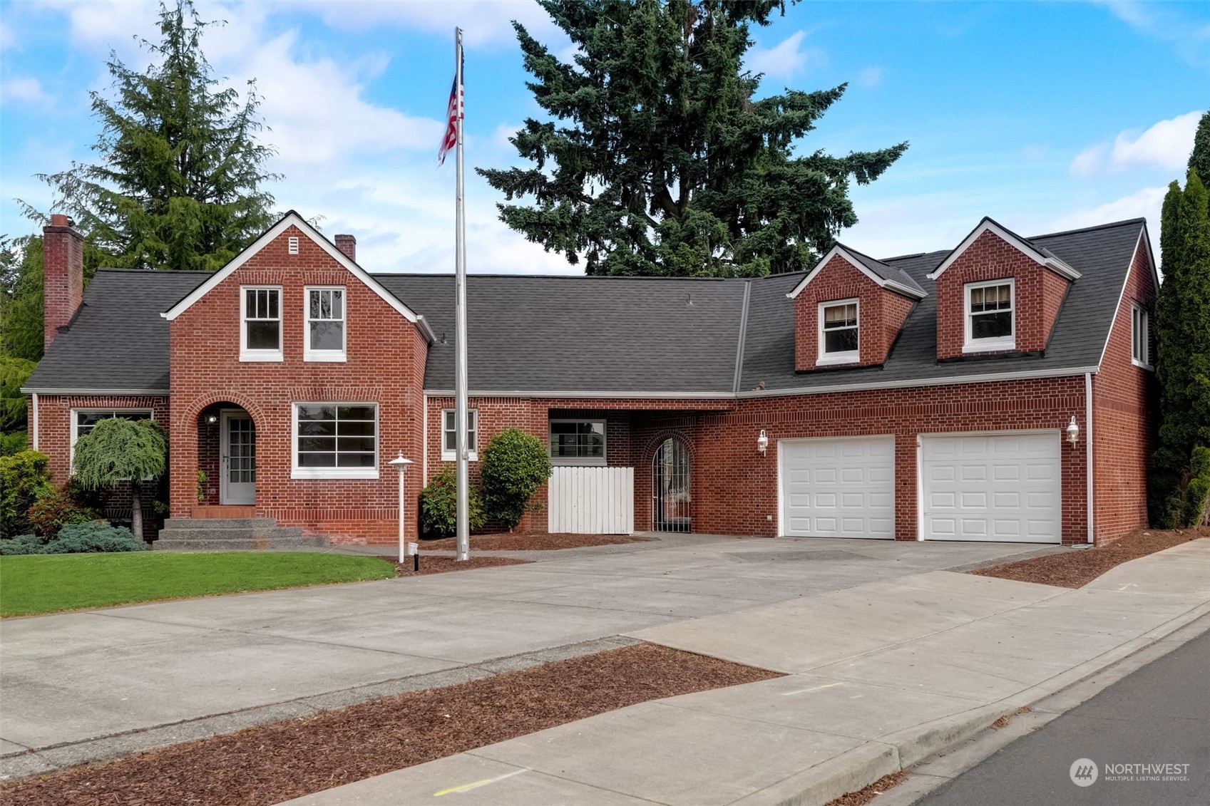 front view of a house with a yard