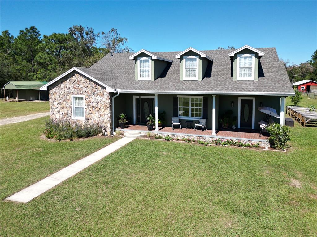 front view of a house with a yard