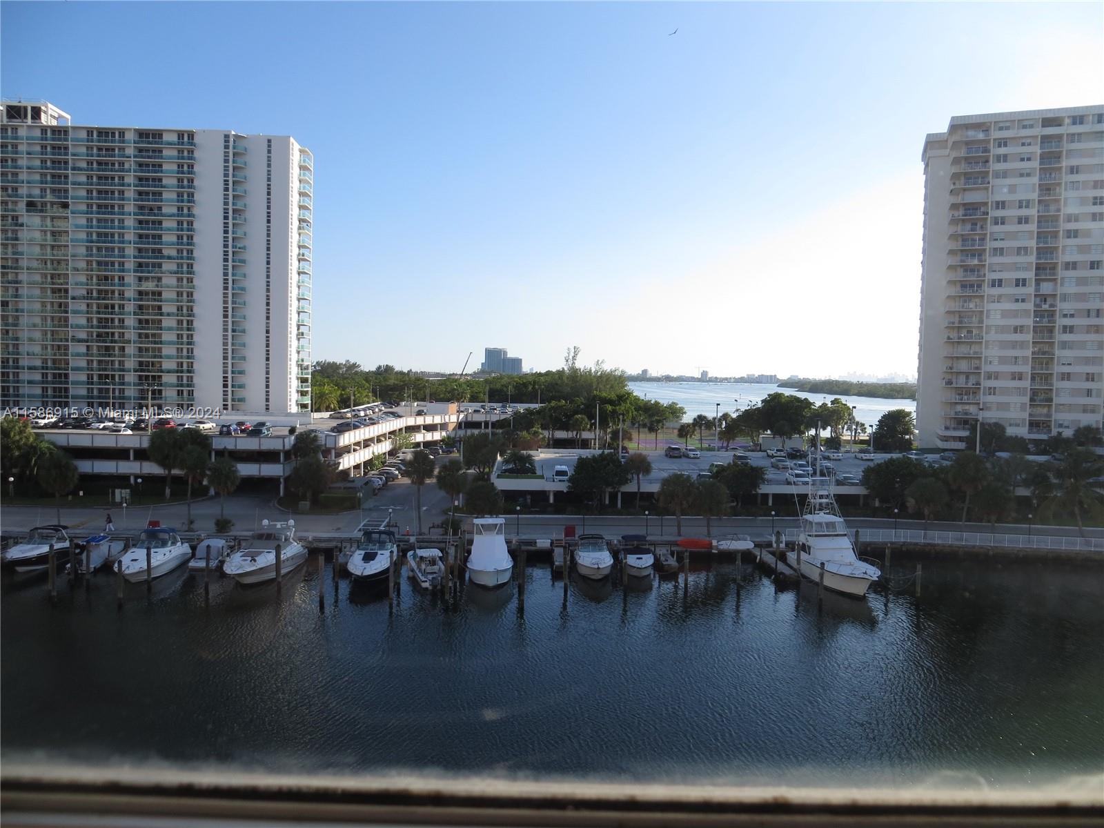 a view of water with building and lake view