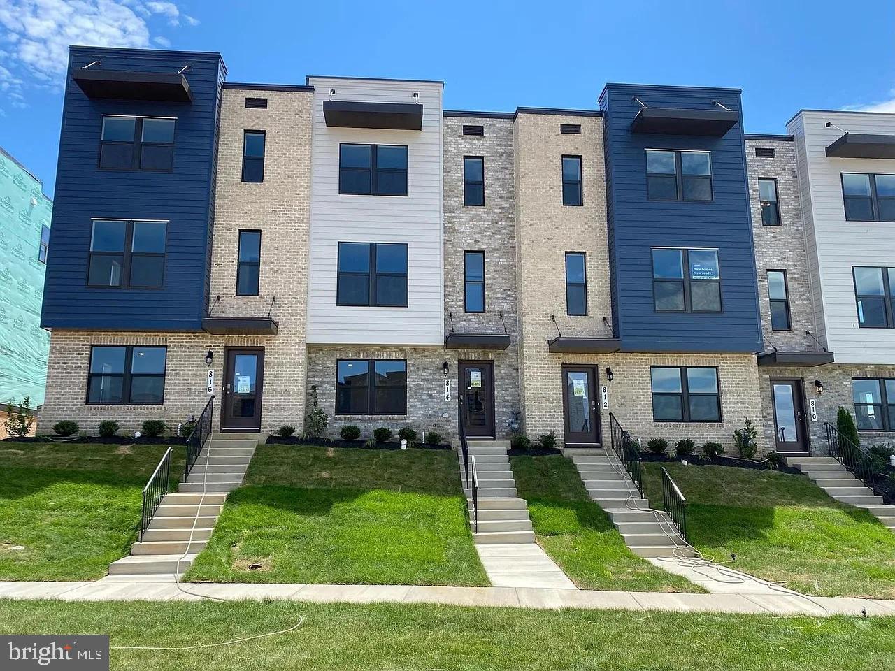 a view of a building with a yard