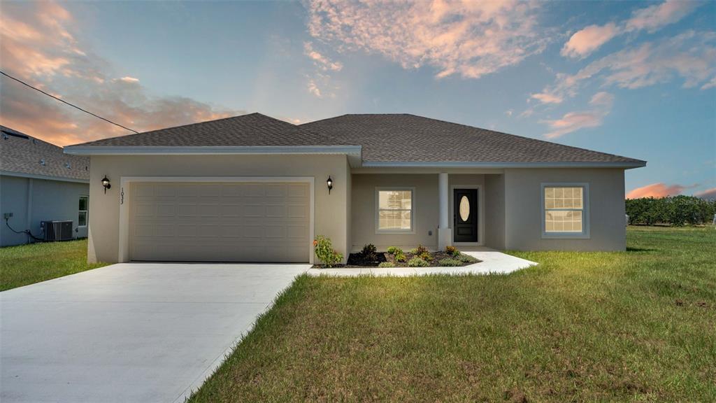 a front view of house with yard