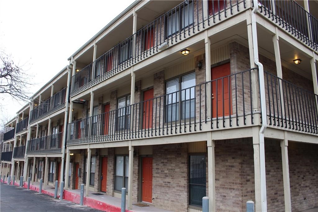 a front view of a building with balcony