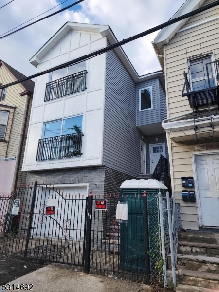 a front view of a house with balcony