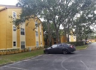 a car parked in front of a house