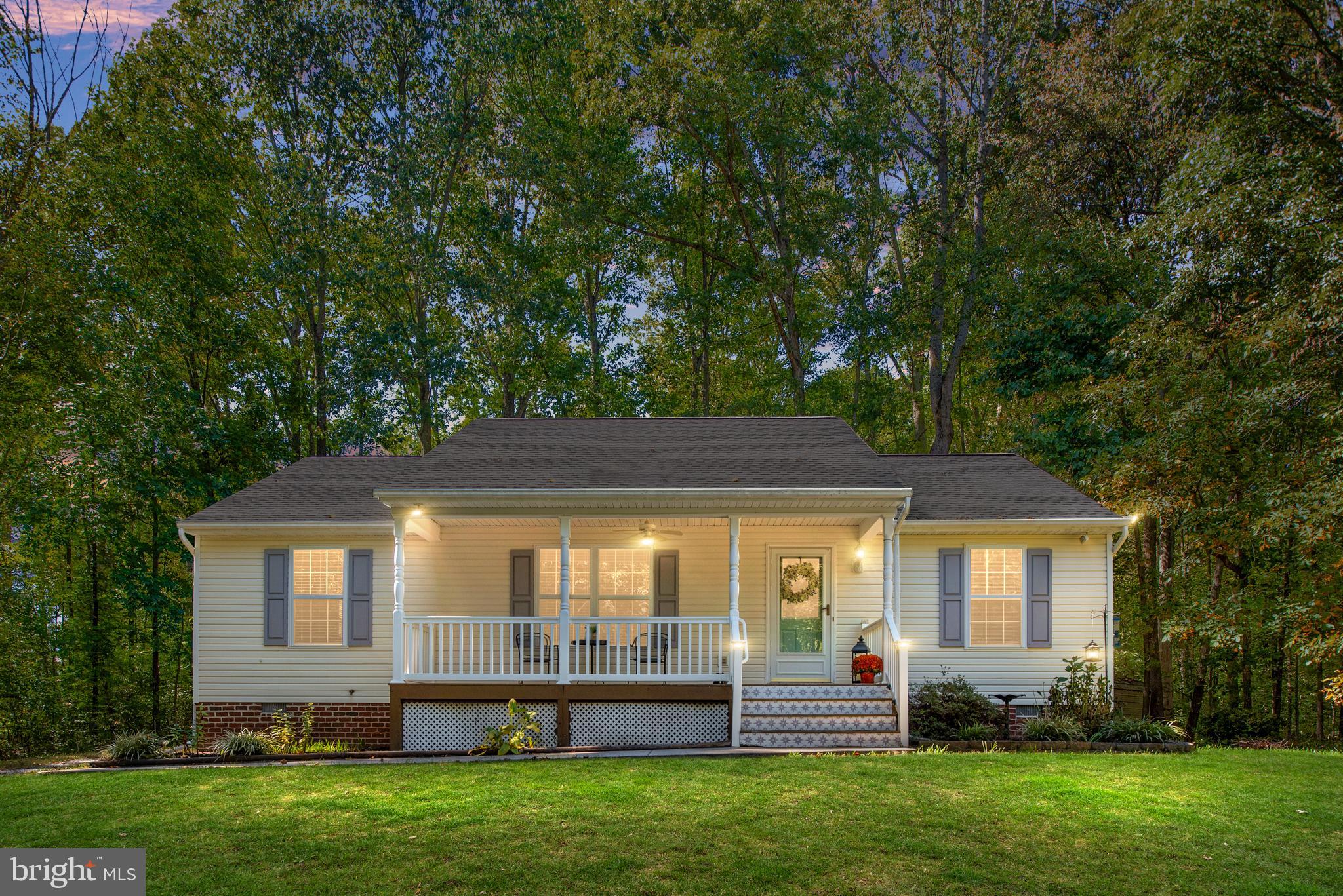 front view of house with a yard