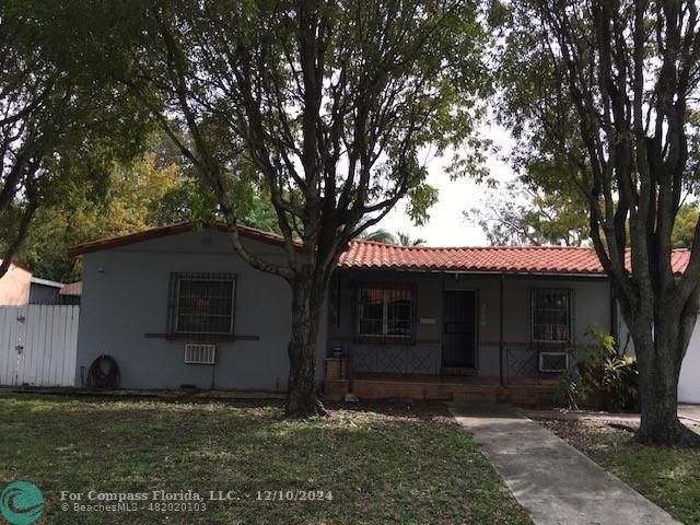 a front view of house with yard