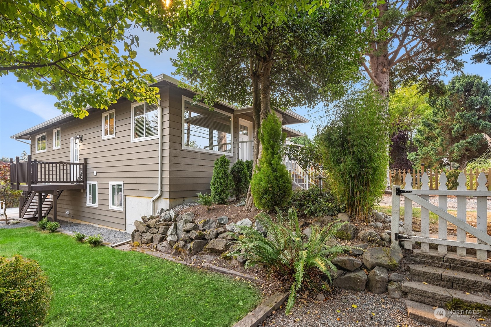 a view of a house with a yard