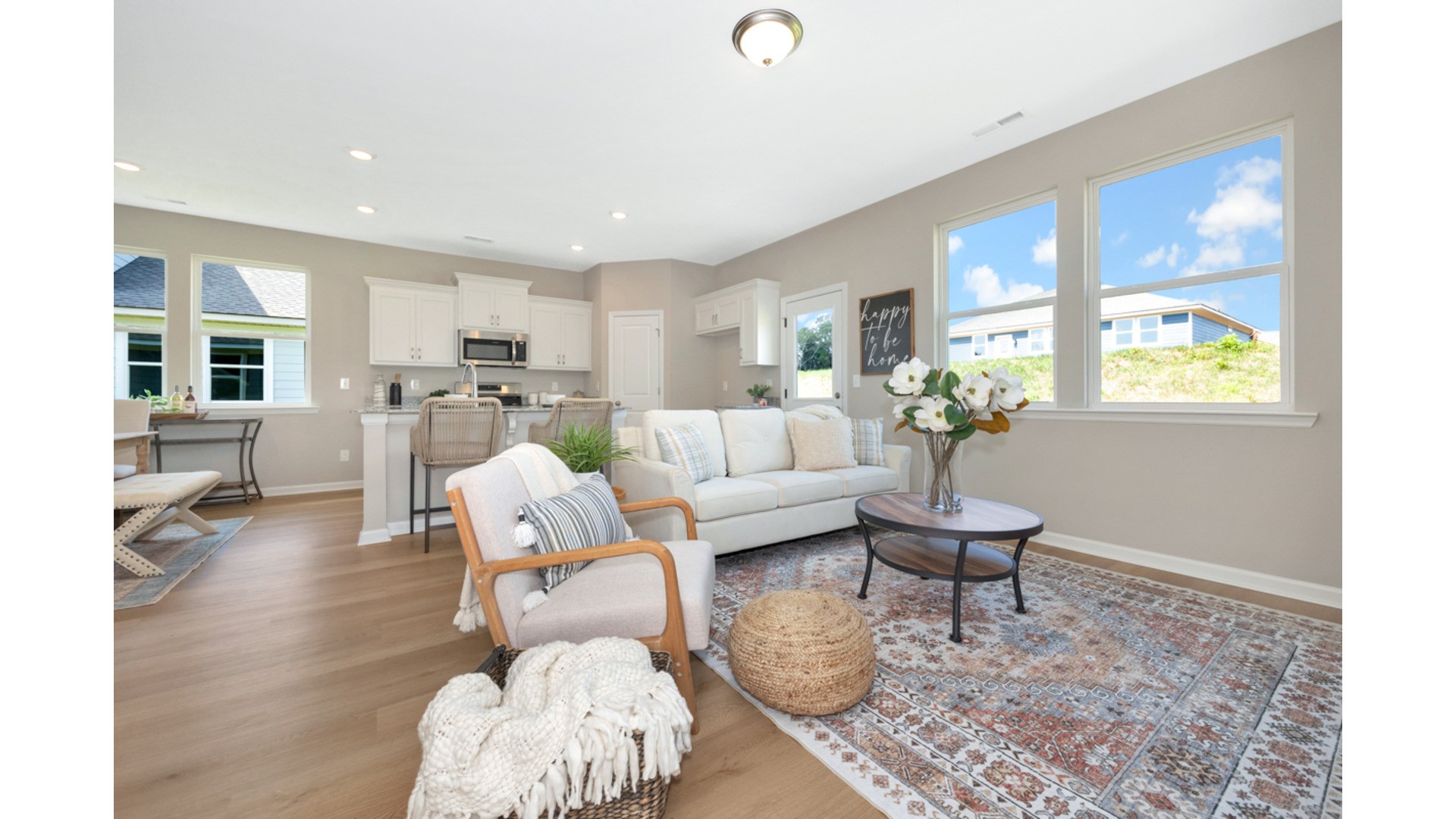 a living room with furniture and a table