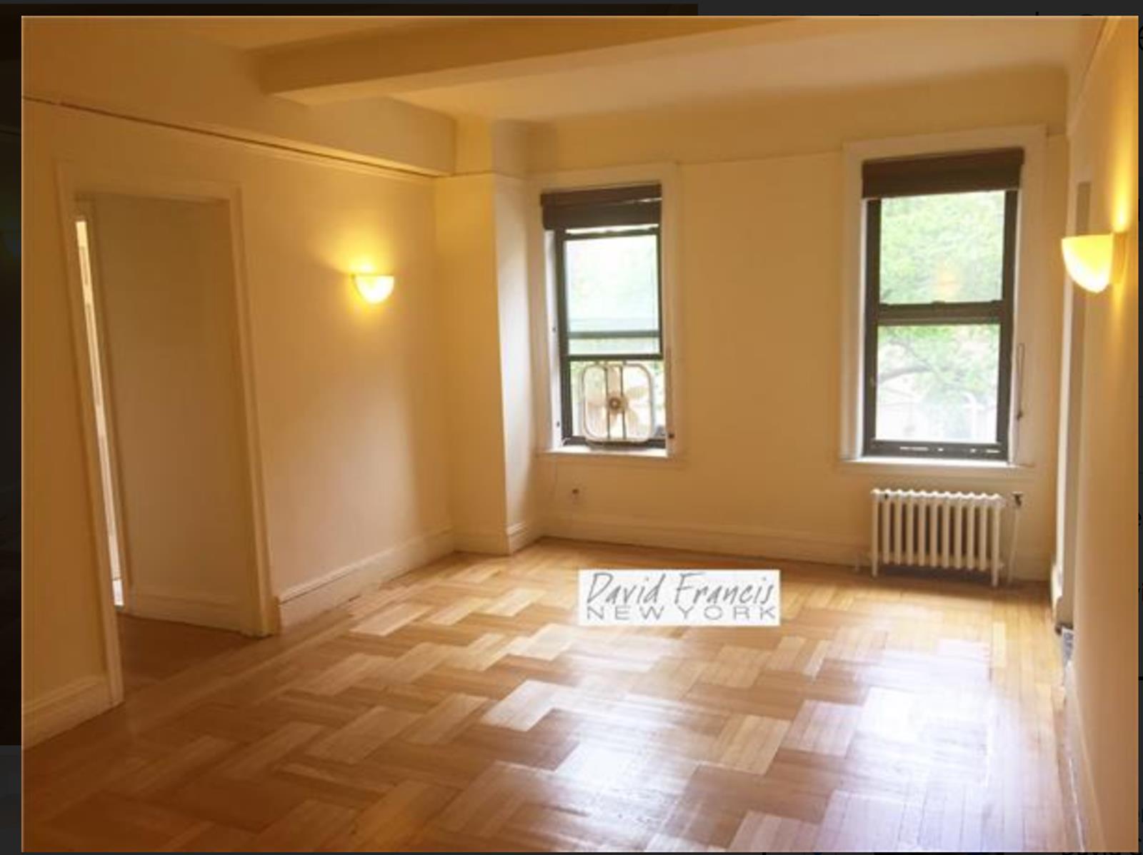 a view of an empty room and window