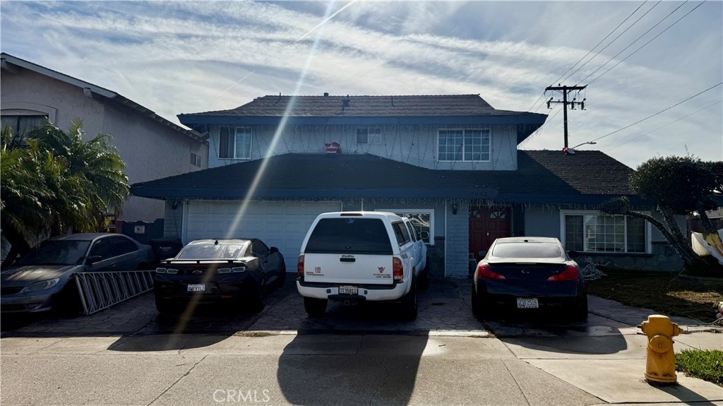 a car parked in front of a house