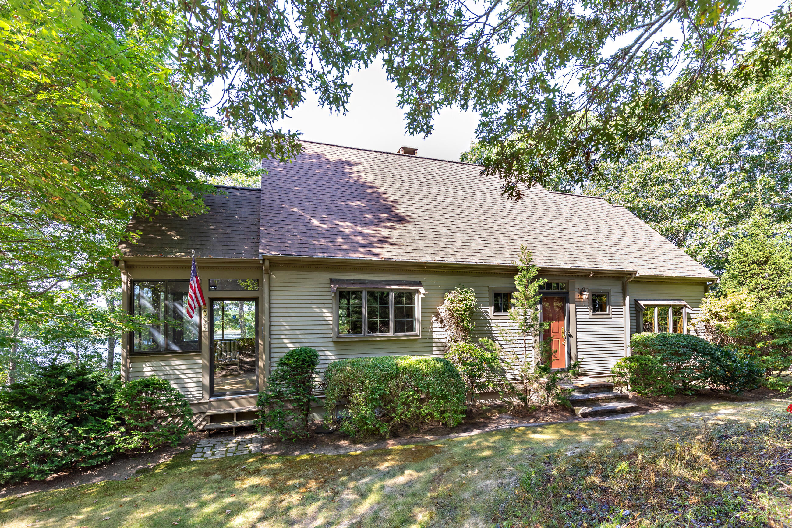 front view of a house with a yard