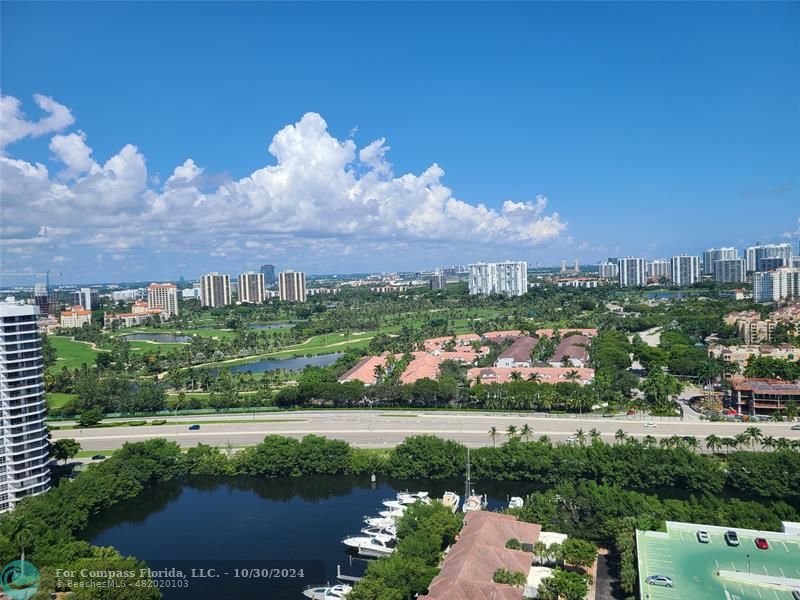 a view of a lake with a city