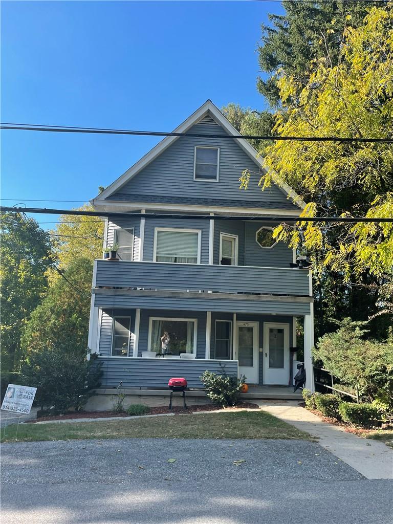 View of front of property featuring a porch