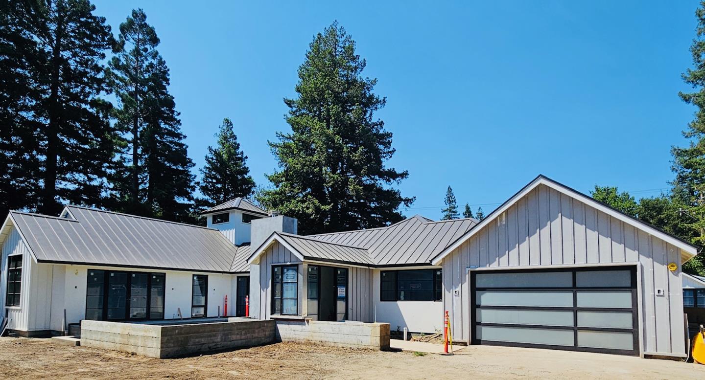 a front view of a house with a garage