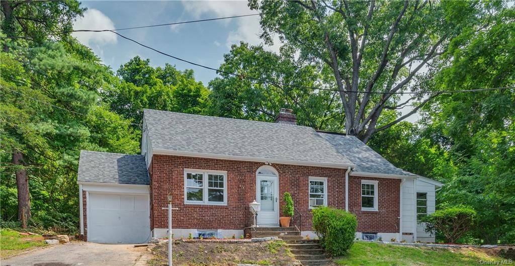 View of front of home with a garage