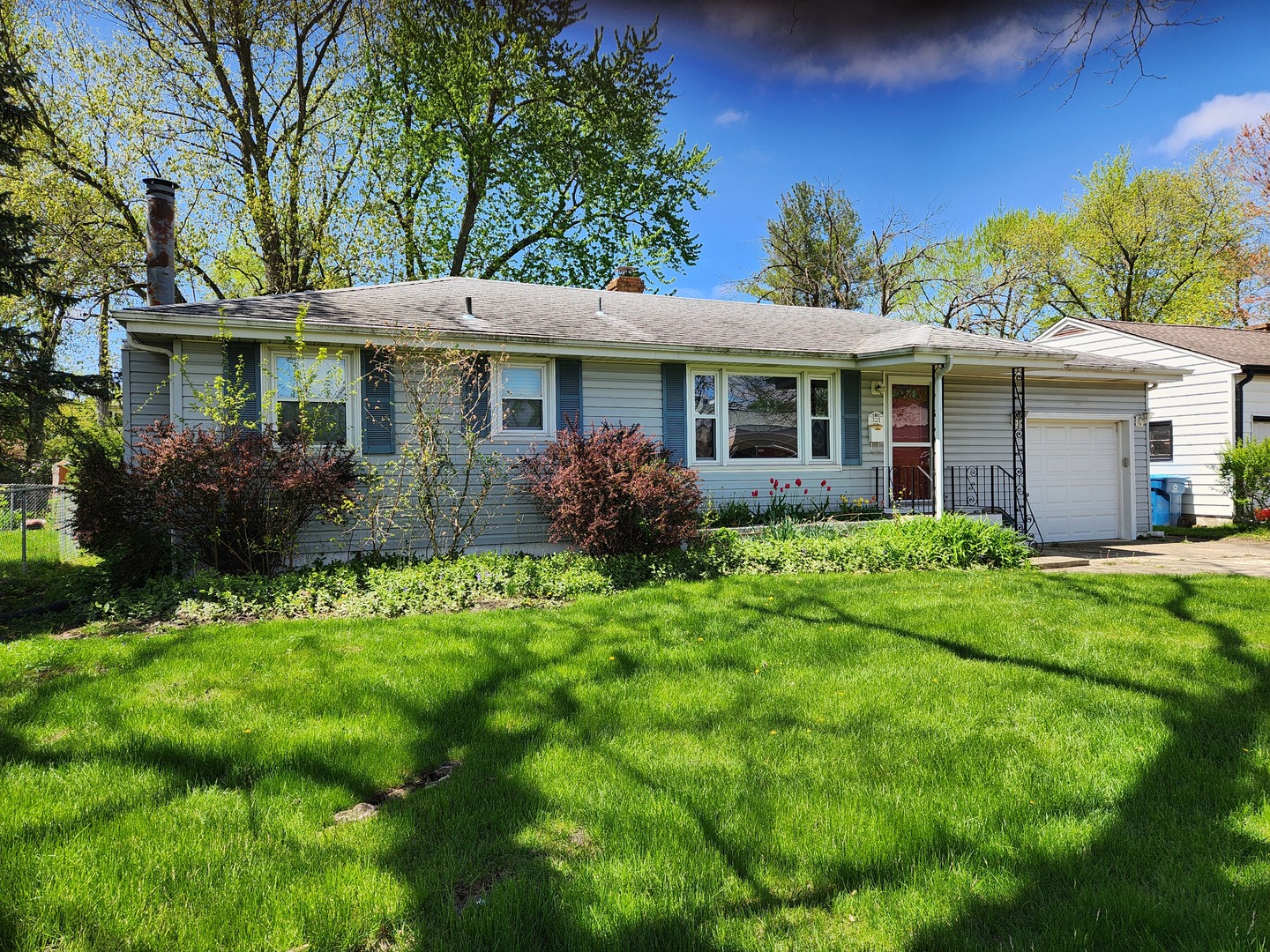 a view of a house with a garden