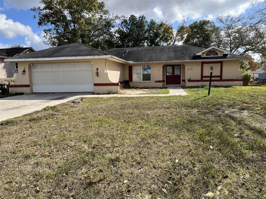 front view of a house with a yard