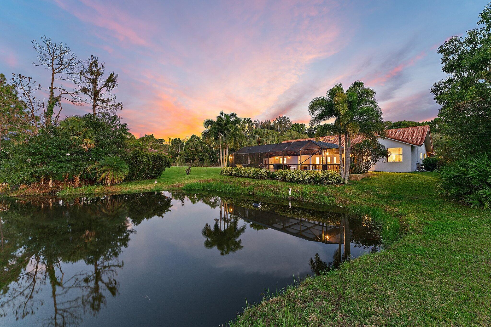 a lake view with a garden