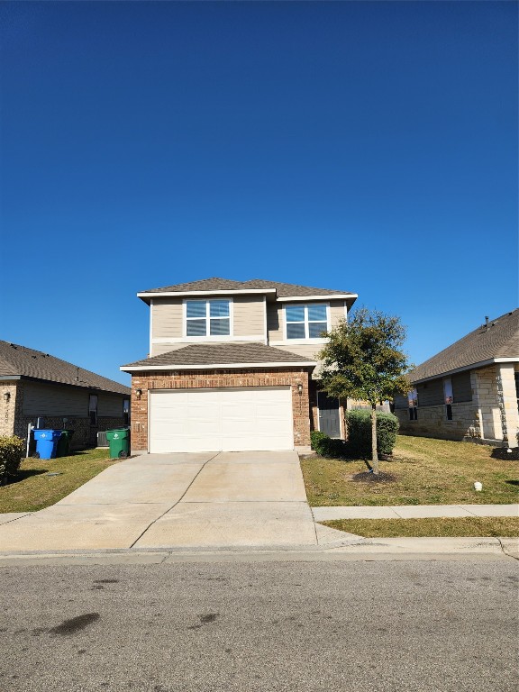 a view of a house with a street