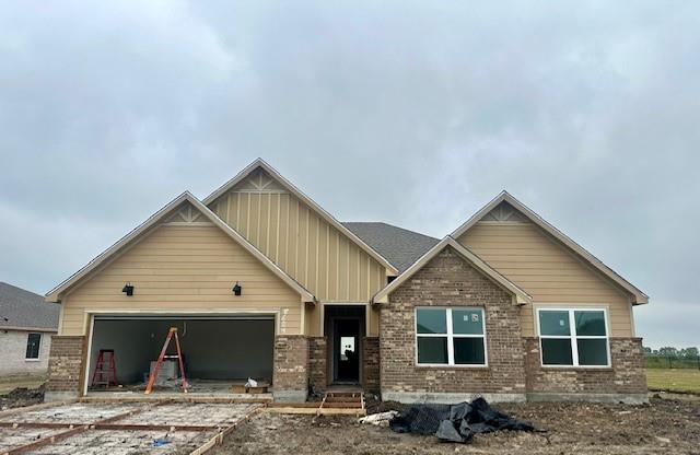 a front view of a house with garage