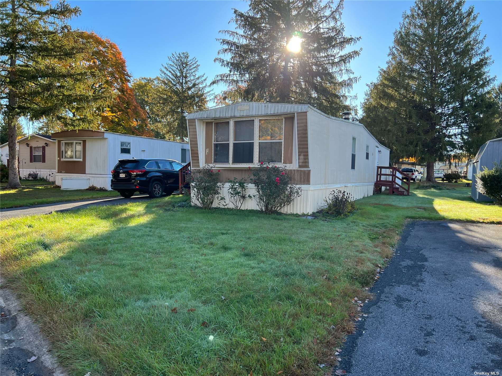 a view of a house with a yard patio and a patio