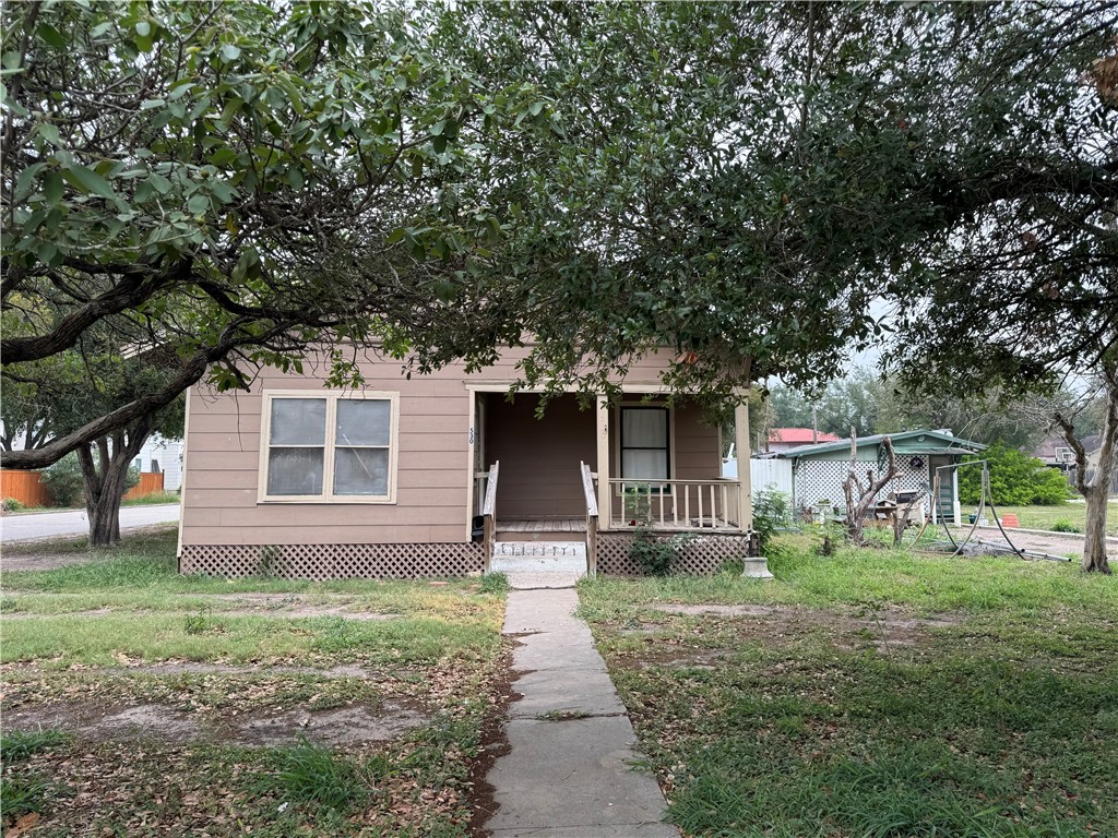 front view of house with a yard