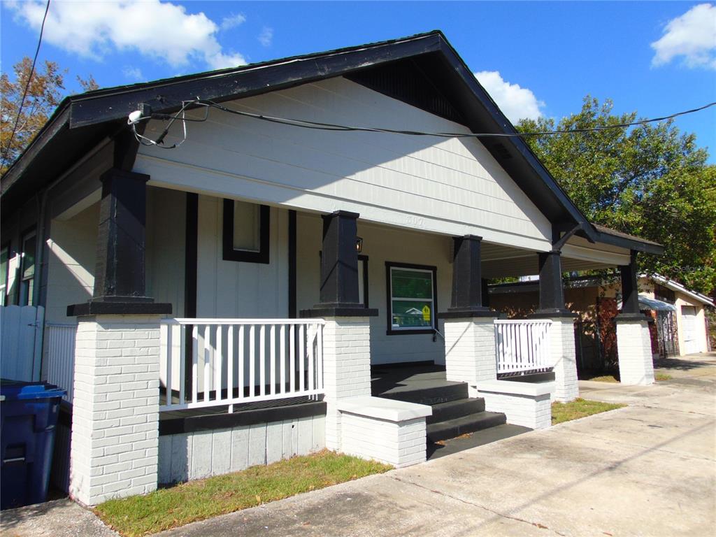 a view of a house with a patio