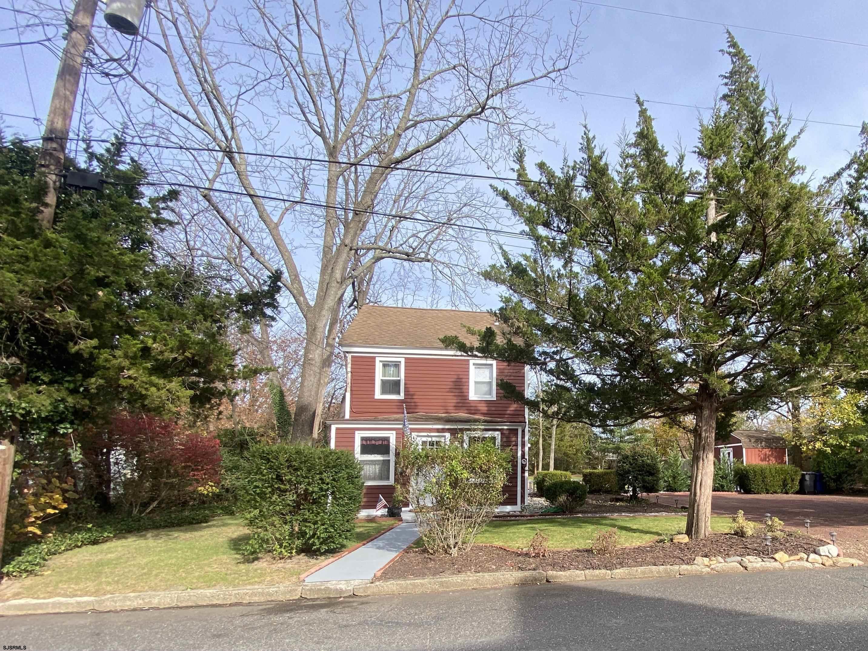 a view of a building with a tree