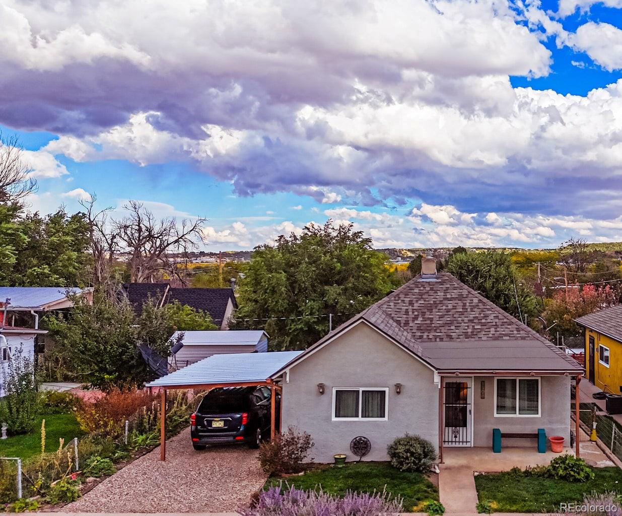 a view of house with outdoor space