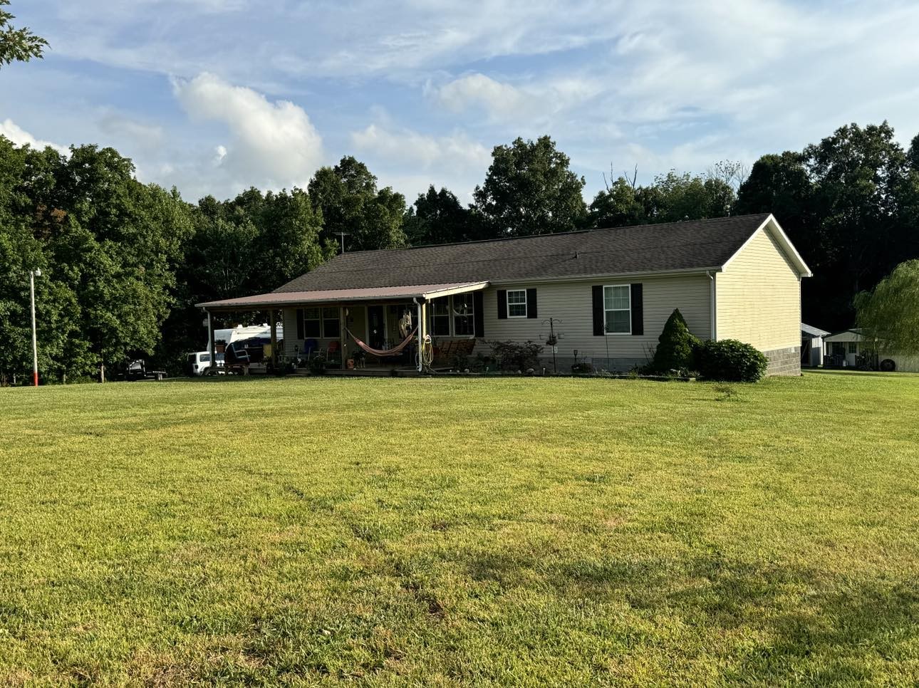 a view of house with outdoor space