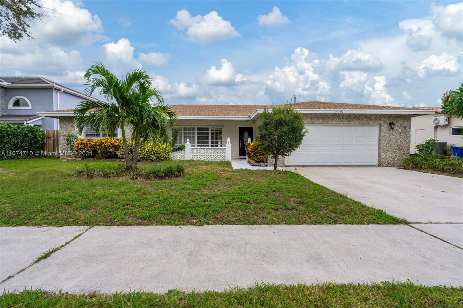 a view of a yard in front of house