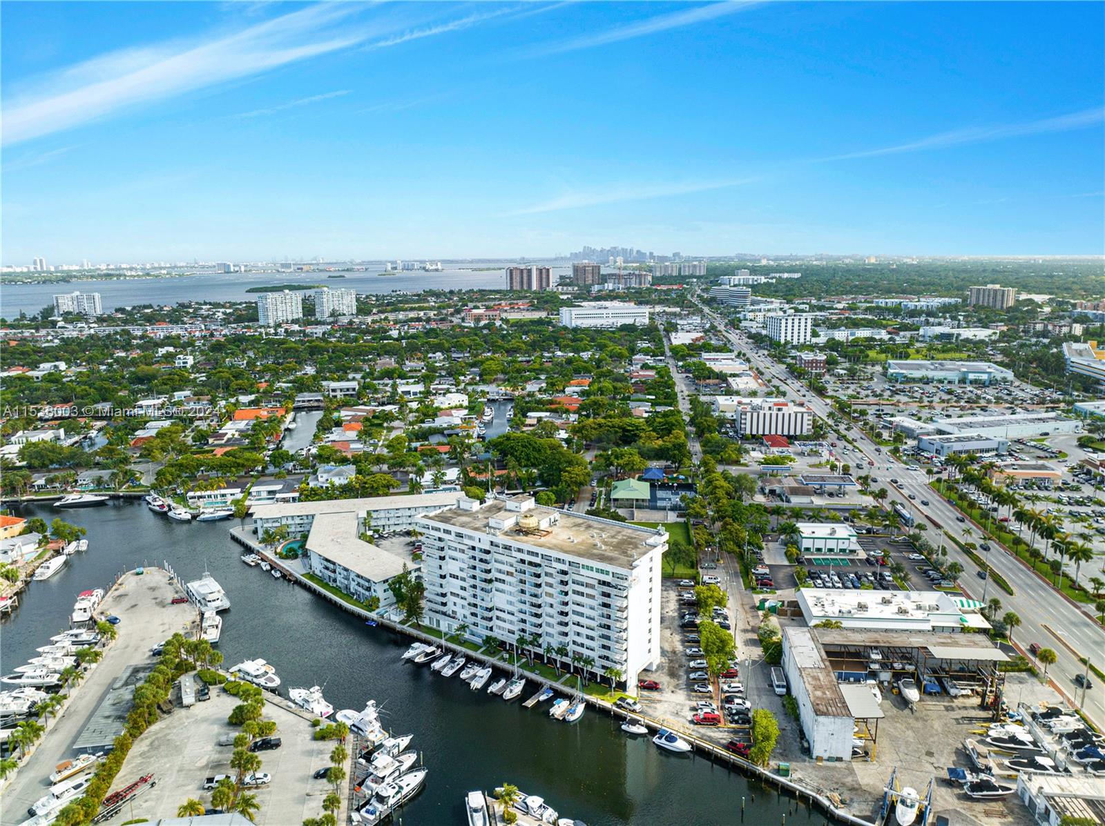 an aerial view of city and lake