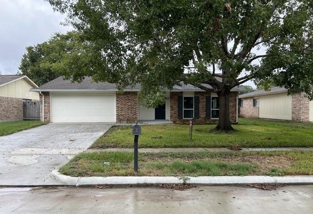 front view of a house and a yard