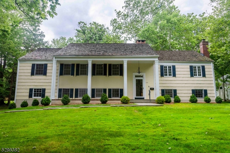 a front view of house with yard