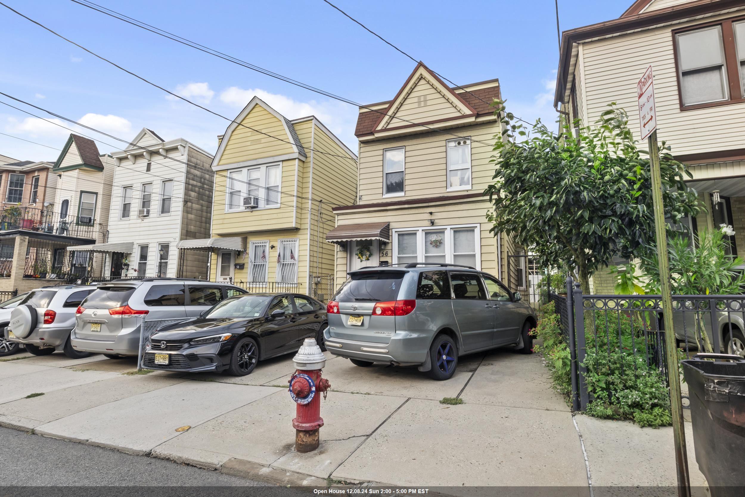 a car parked in front of a house