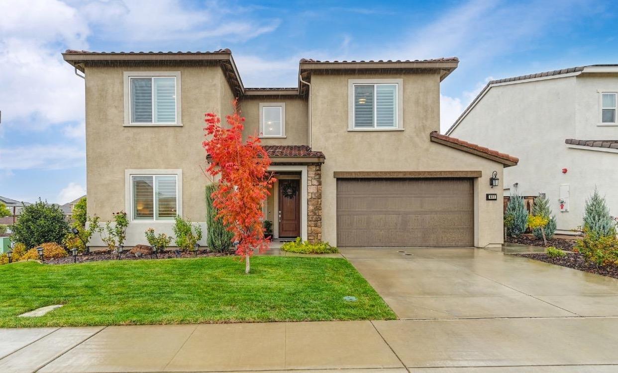 a front view of house with yard