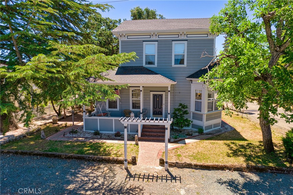 a front view of a house with porch