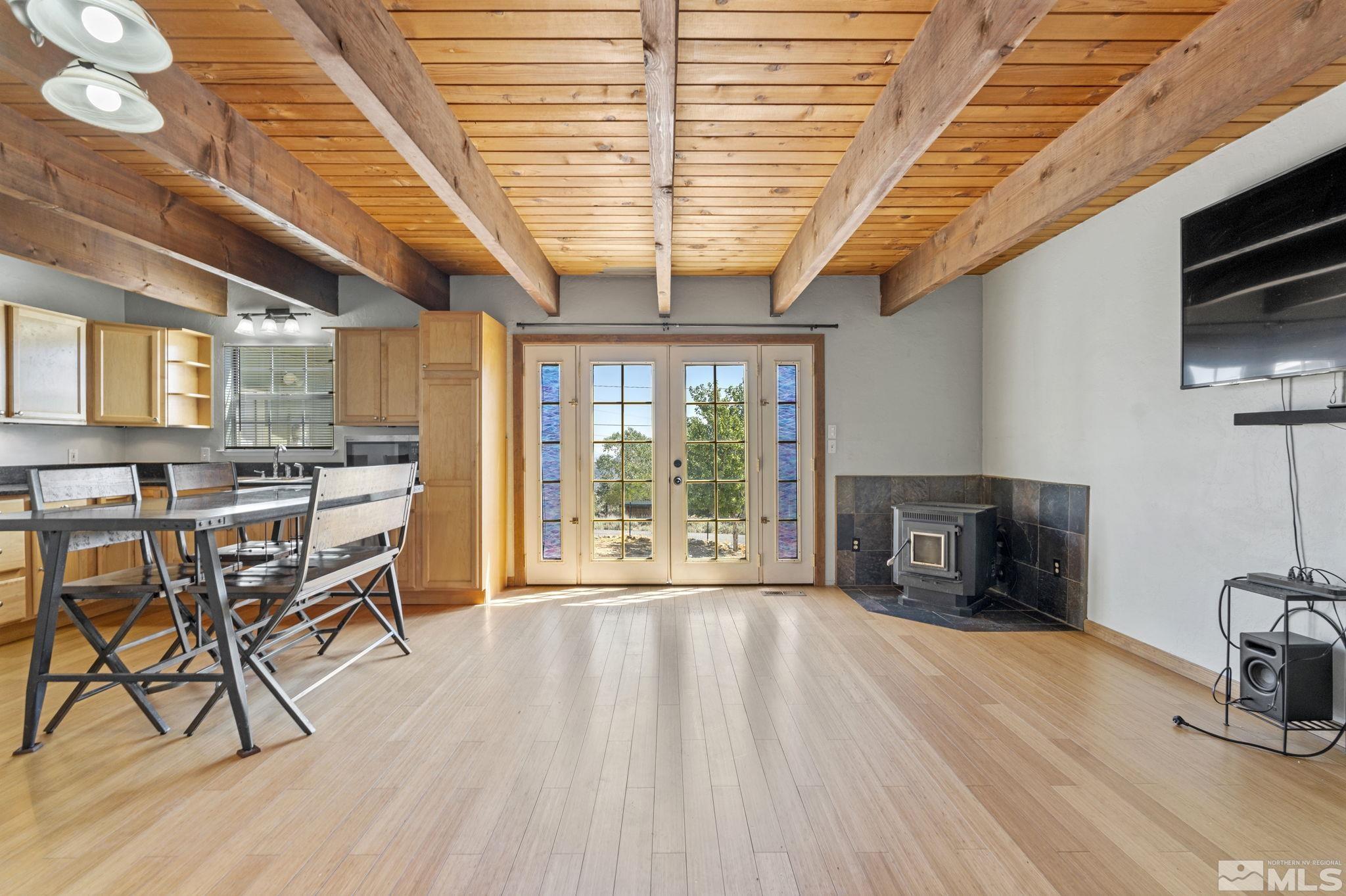 a dining room with furniture and fireplace