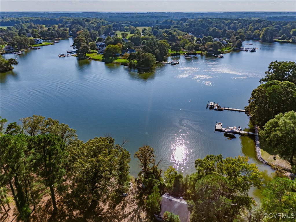 an aerial view of a houses with city view