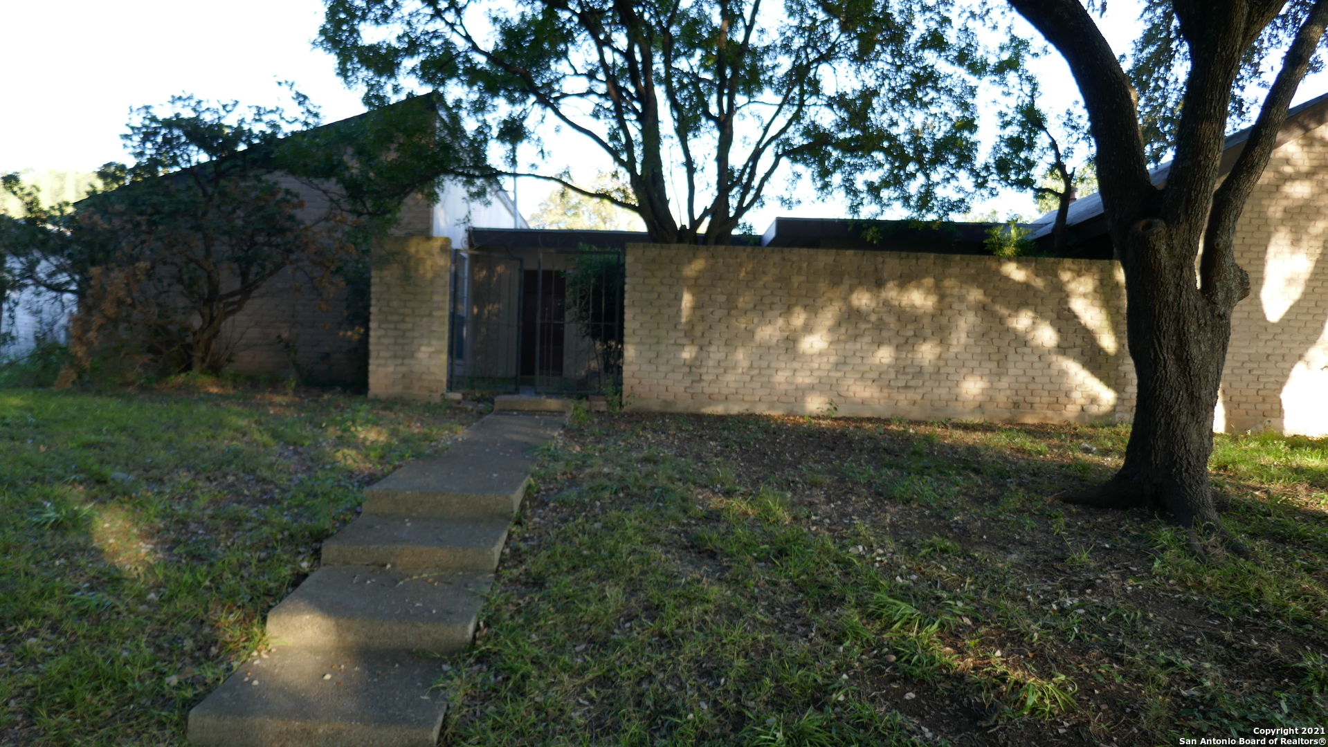 a view of backyard with green space