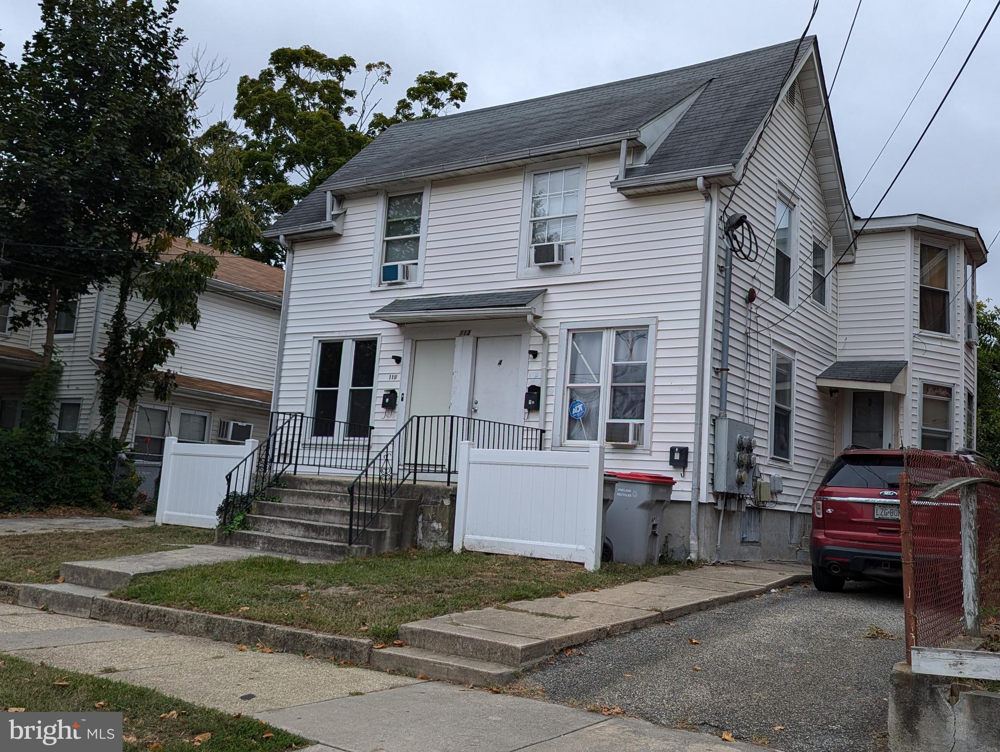 a front view of a house with a garage